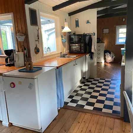 A Cozy Older Summerhouse On A Small Island *