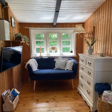 A Cozy Older Summerhouse On A Small Island